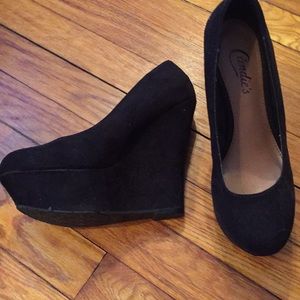 Black closed toe wedge heels